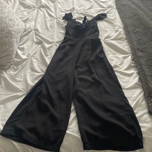 Black jumper with half open back